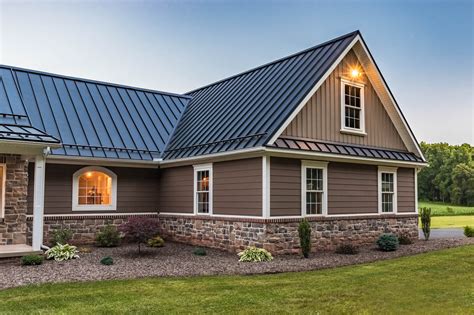 brick on metal house|homes with brown metal roofs.